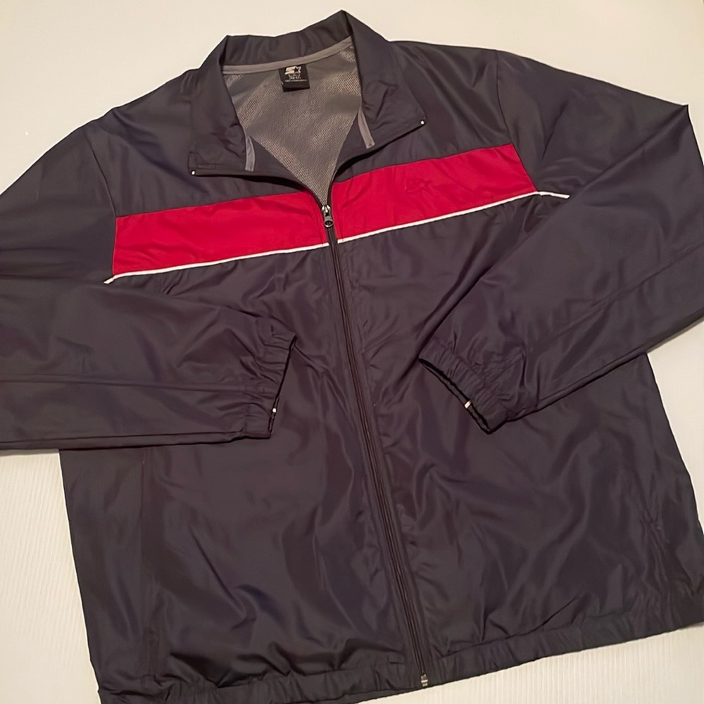 Starter charcoal gray & brick red, full zip windbreaker.  Men’s size Large